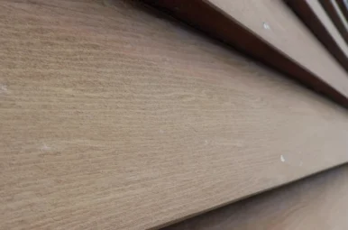 The result of paint stripping process showing weatherboards with all the paint removed.